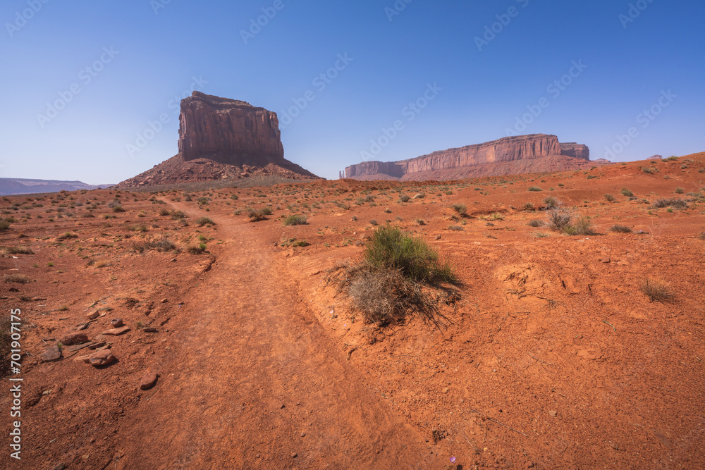 hiking the wildcat trail in monument valley, arizona, usa hiking the wildcat trail in monument valley, arizona, usa