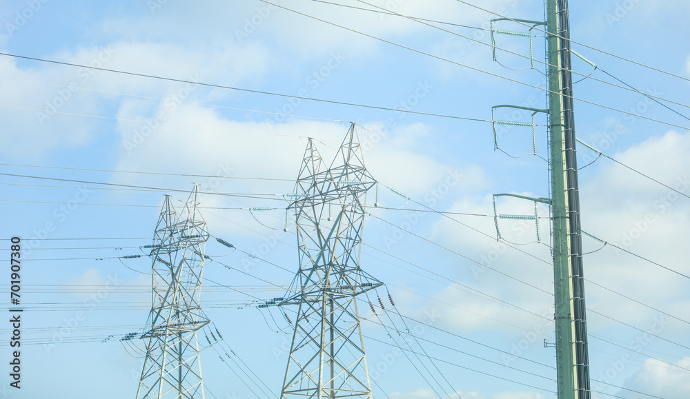 Electric power lines silhouette against vibrant sky, symbolizing energy, connection, and modern infrastructure Electric power lines silhouette against vibrant sky, symbolizing energy, connection, and modern infrastructure