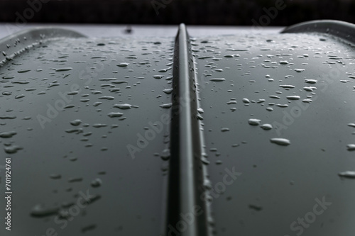 Bottom of wet rowboat with view of lake