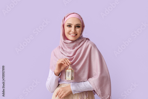 Smiling muslim woman in pin...