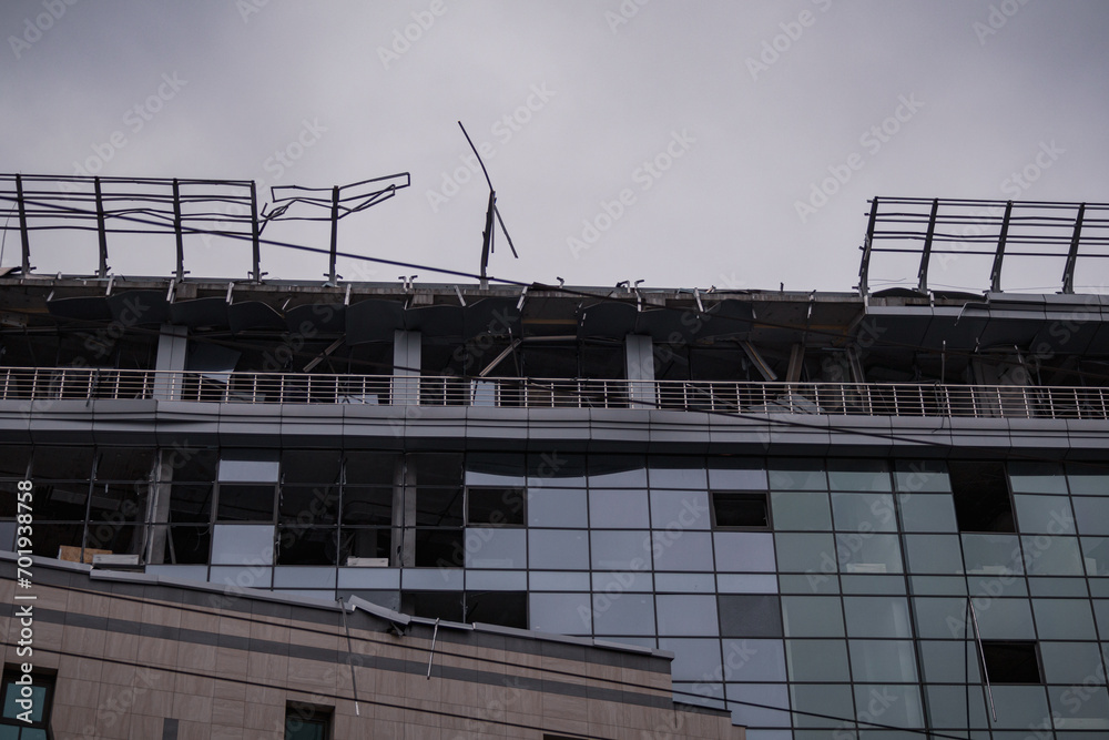Kyiv, Ukraine - December 29, 2023: The Russian army launched a missile attack on Ukraine. One of the affected places. In the glass business center, the blast wave blew out all the windows