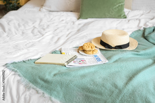 Cookies, newspaper and hat ...