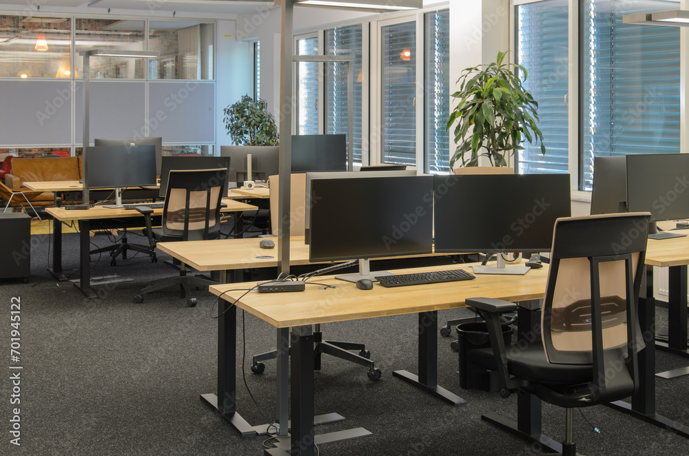 Advanced IT office with rows of workstations