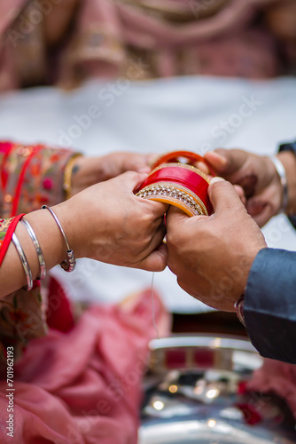 Indian Punjabi pre wedding choora chura ceremony bride's bangles close up