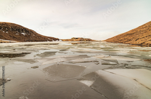 Il lago Scaffaiolo ghiacciato a inizio anno photo