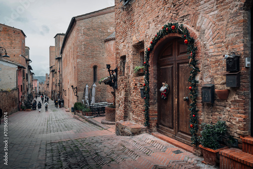Fototapeta Naklejka Na Ścianę i Meble -  Streets of the medieval Tuscan town of Certaldo. Winter in Tuscany, Italy