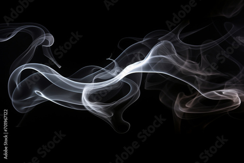 Abstract smoke swirls in a mysterious black background