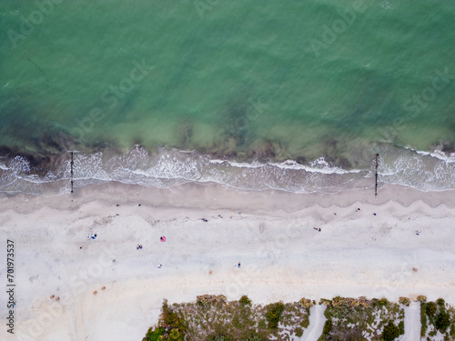 Waves breaking on the white sands of Madeira Beach in Florida, USA