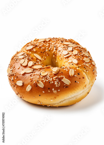 Tasty bagel with seeds on the white background