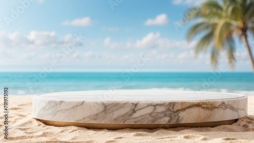 marble podium for product presentation on beach sand with blurred beach background © adynue