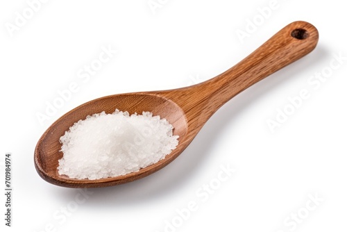 Isolated wooden spoon with salt on white background