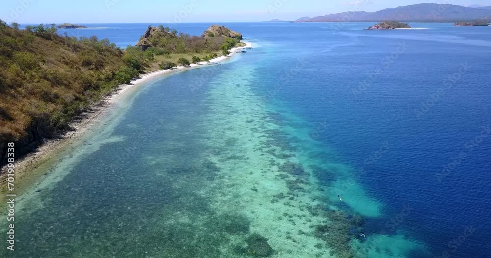 Aerial View of Nunsa Tiga, an island in the 17 Island Marine Park in East Nusa Tenggara, Indonesia. Aerial View of Nunsa Tiga, an island in the 17 Island Marine Park in East Nusa Tenggara, Indonesia.