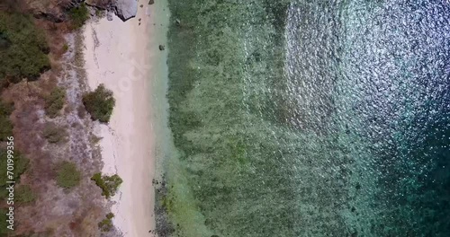 Aerial View of Nunsa Tiga, an island in the 17 Island Marine Park in East Nusa Tenggara, Indonesia.  photo