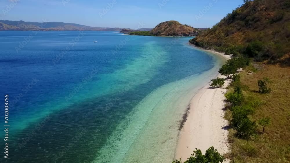 Aerial View of Nunsa Tiga, an island in the 17 Island Marine Park in East Nusa Tenggara, Indonesia. Aerial View of Nunsa Tiga, an island in the 17 Island Marine Park in East Nusa Tenggara, Indonesia.