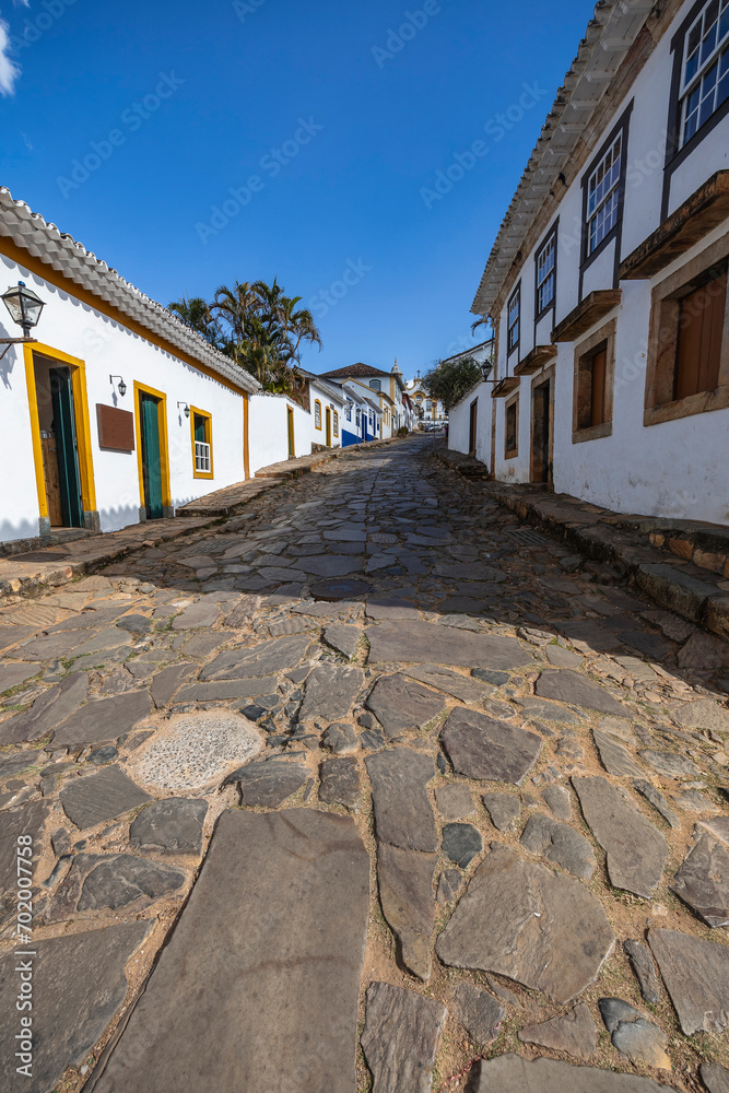 Streets of cobblestone and old historical houses in colonial style on Tiradentes, Minas Gerais, Brazil