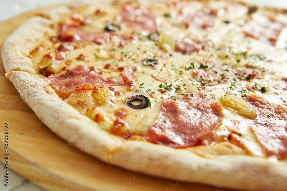 pizza on a wooden board pizza on a wooden board