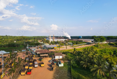 Aerial view of an industrial complex in the middle of an oil palm plantation in Central Kalimantan, Indonesia. photo