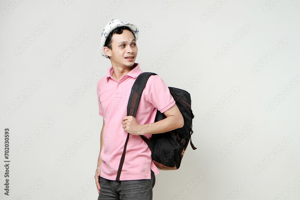 Asian man backpacker portrait. digital nomad and travelling concept. on isolated background
