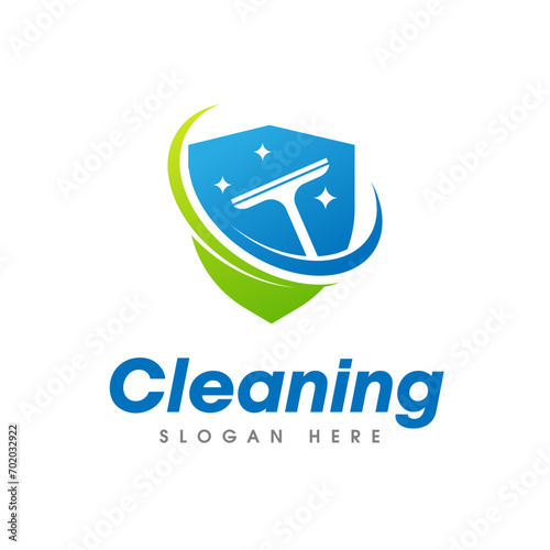 Cleaning Service Business Logo. Window squeegee isolated on shield shape