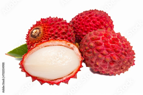 A strange tropical fruit, captured in a professional photo, is presented on a white surface.