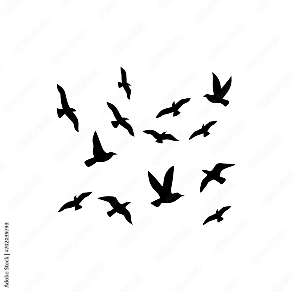 Flock of flying birds silhouette 