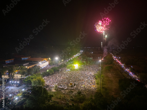 Celebration. Skyline with fireworks light up sky in Ba Den mountain, Tay Ninh city, Vietnam. Beautiful night view cityscape. Holidays, celebrating New Year and Tet holiday