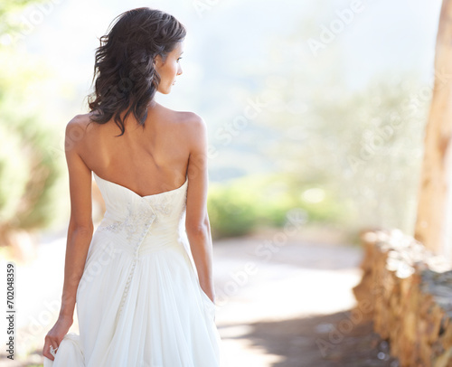Garden, woman or back of bride in wedding with celebration outdoor, summer or ceremony event. Marriage dress, elegant style and bridal garment for commitment, love or fashion in park or nature space