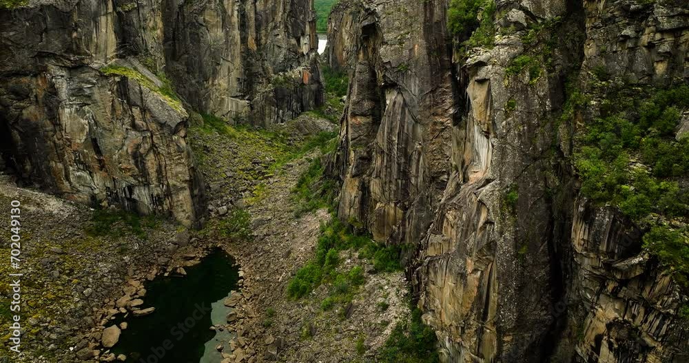 Eroded Rock Layers Of Hellmojuvet Canyon In Northern Norway. Aerial Close-Up Shot