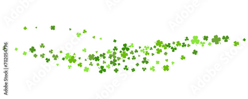 St. Patrick Day shamrock clover background. Wavy vector border with flying green leaves for posters banners and greeting cards. photo