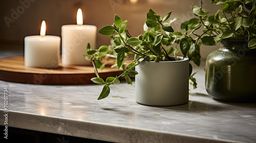 Candles and housplants, decorative hygge comfortable modern home, wood and earth elements, counter top photo