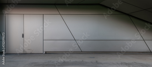 Metal facade of modern building with ramp photo