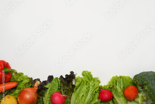 Organic vegetables on white background. Healthy eating, vegetarian food and nutrition concept.