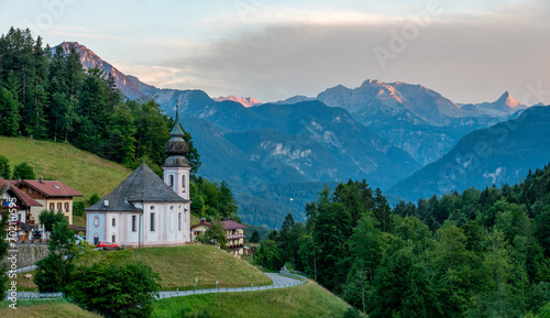 Berchtesgaden Maria Gern Church view with a curved road and an awesome mountain view photo