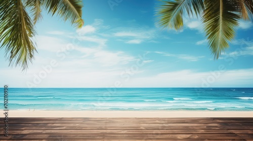 Seascape with waves  palm leaves  a blue sky with clouds  and an empty wooden floor.