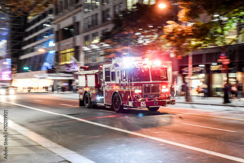 New York, NY USA Fire truck with emergency lights on the street of Manhattan photo
