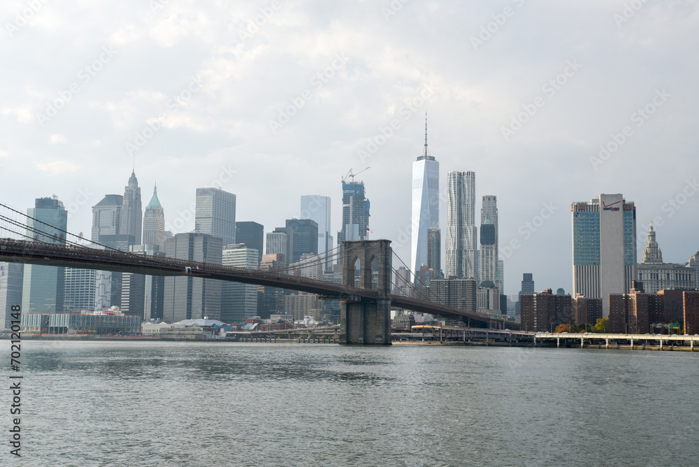 New York City skyline with Brooklyn Bridge and Lower Manhattan view New York City skyline with Brooklyn Bridge and Lower Manhattan view