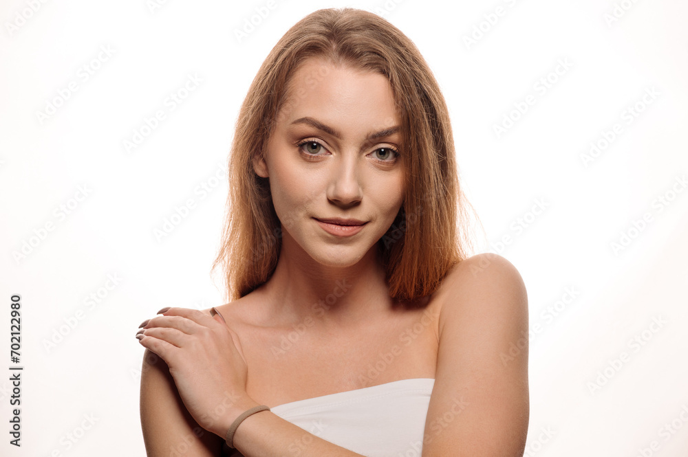 Beauty portrait of pretty blonde girl on white isolated background. Skin care concept Beauty portrait of pretty blonde girl on white isolated background. Skin care concept