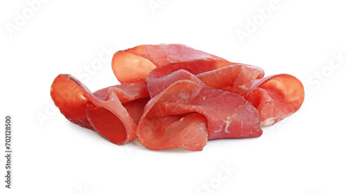 Slices of tasty bresaola isolated on white photo