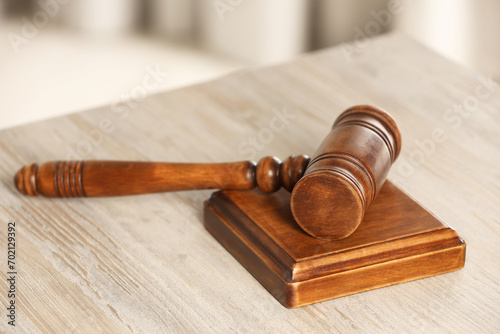 Law concept. Gavel on wooden table, closeup