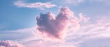 A Heartshaped Cloud Formation In A Pastelcolored Sky With The Caption Love In The Air