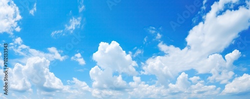 Relaxing View Of Clear Blue Sky And Fluffy White Clouds Vibrant Blue Sky With Fluffy White Clouds © Ян Заболотний