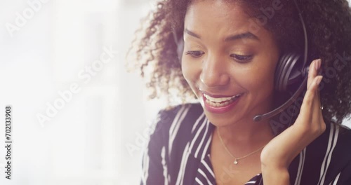 Phone call, black woman in callcenter and contact us with CRM, communication and customer service consultant. Help desk, headset with microphone and agent in telemarketing sales, telecom and advice photo