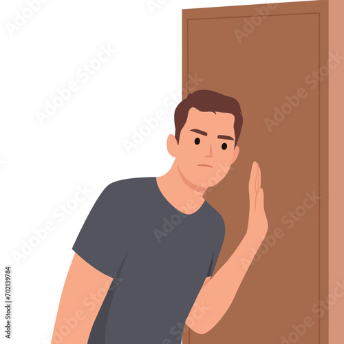 Embarrassed man leaned against door wanting to eavesdrop on someone else secret or hear conversations of people behind wall. Thoughtful guy in t-shirt spying on neighbors. Flat vector illustration 
