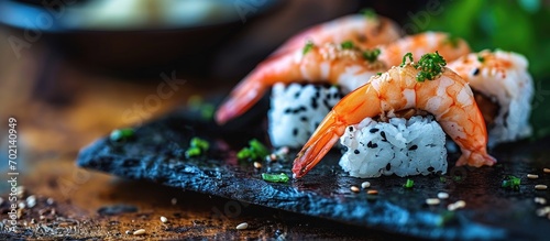 Black tiger prawn sushi topped with seafood. with copy space image. Place for adding text or design
