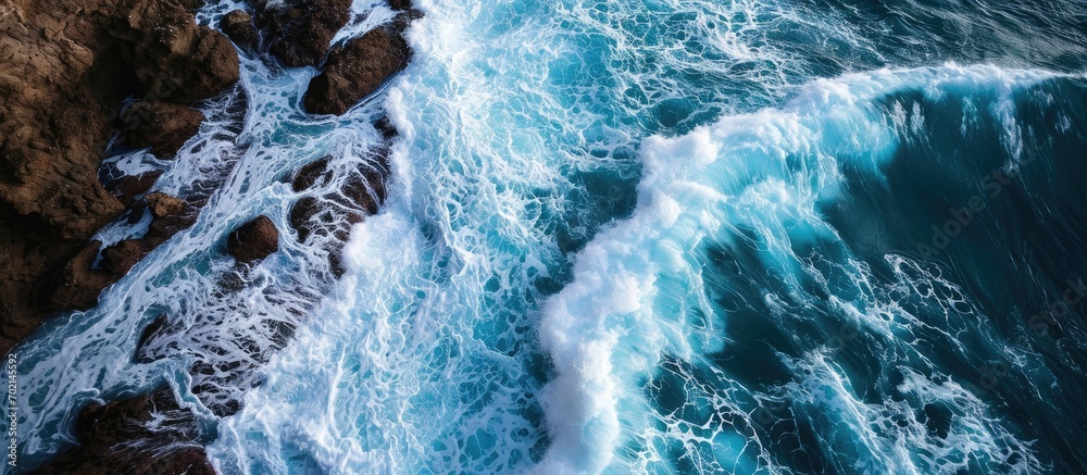 Aerial view of powerful wave breaking near shore. with copy space image. Place for adding text or design