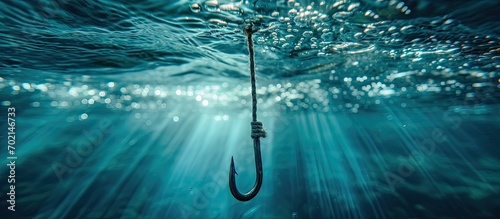 Fishing Close up shut of a fish hook under water. with copy space image. Place for adding text or design photo