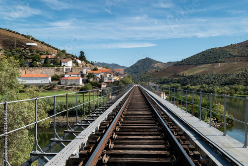 Ponte metálica com a linha de ferro na foz do rio Douro com o rio Tua em Trás os Montes, Portugal
 photo