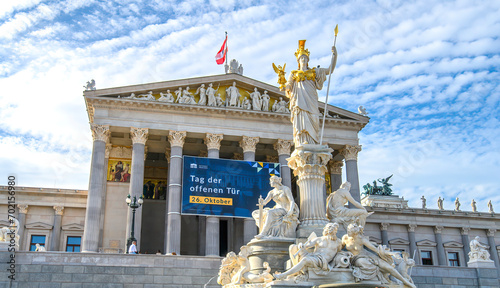 The Austrian Parliament Building and the Pallas Athena Fountain in Vienna, Austria photo