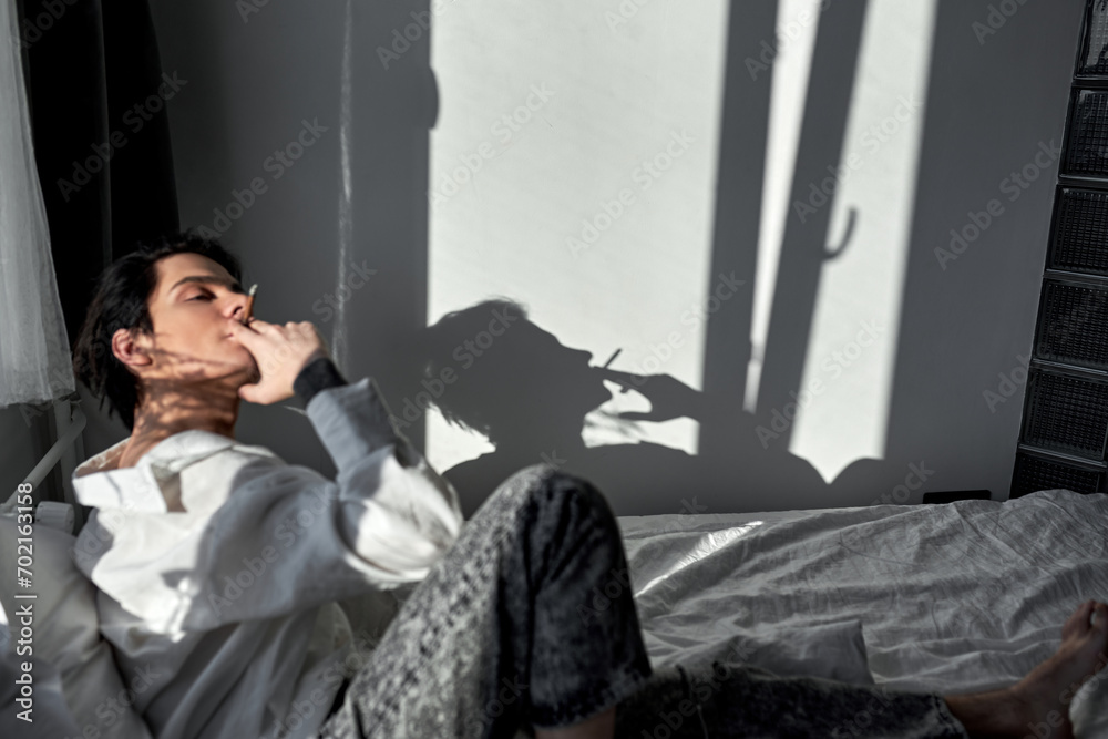 sexy young man takes drugs. self-sufficiency, side view shot.feelings of depression, sexy young man takes drugs. self-sufficiency, side view shot.feelings of depression,