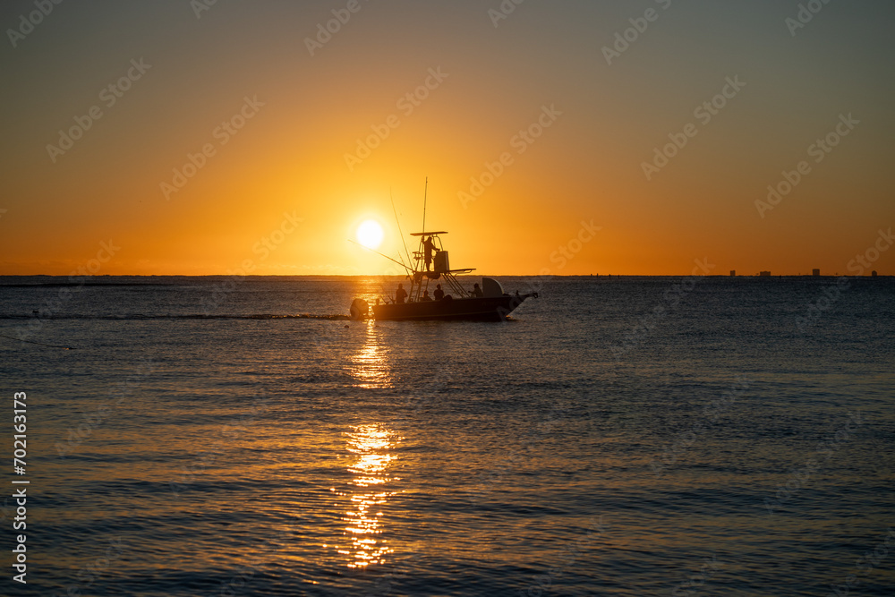 fishing boat at sunset